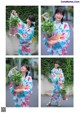 A woman in a kimono holding a bunch of flowers.